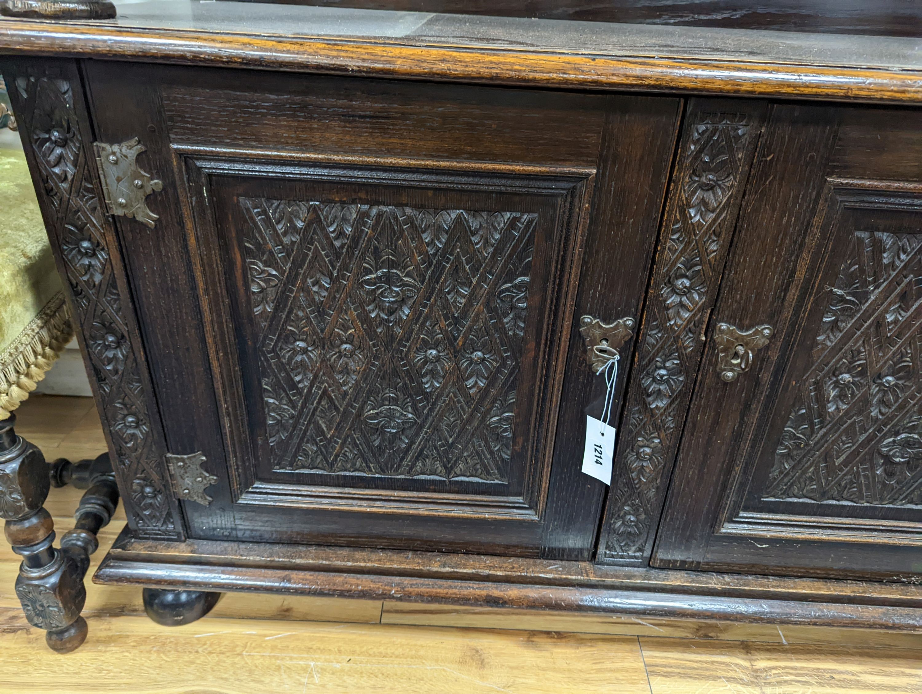 An 18th century and later oak buffet, length 140cm, depth 46cm, height 135cm